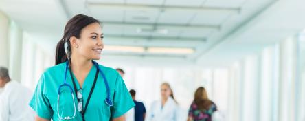 Doctor walking through hospital hallway